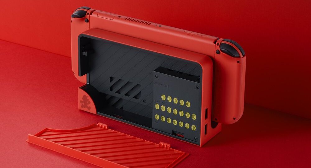 New Nintendo Switch – OLED Model: Mario Red Edition revealed featuring a console, dock and Joy-Con controllers all in the Mario Red color, there are also hidden coins when you open the dock