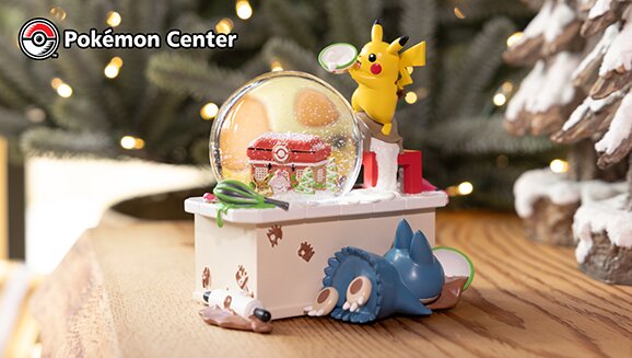 The official 2023 Pokémon Center Holiday Collection features this new adorable snow globe with Pikachu, Teddiursa and Munchlax